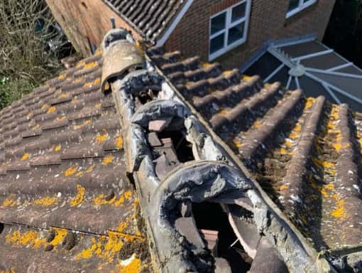 This is a photo of a damaged roof before the roofing repairs. This work was carried out by Hinckley Roofing