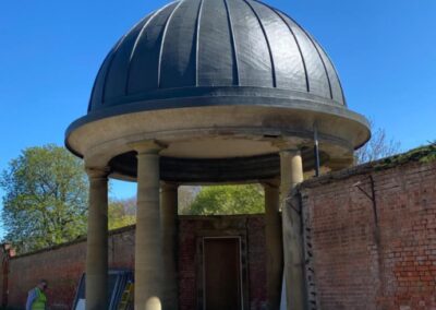 This is a photo of a feature dome building in a park in Hinckley that has had a new lead roof. This was done by Hinckley Roofing
