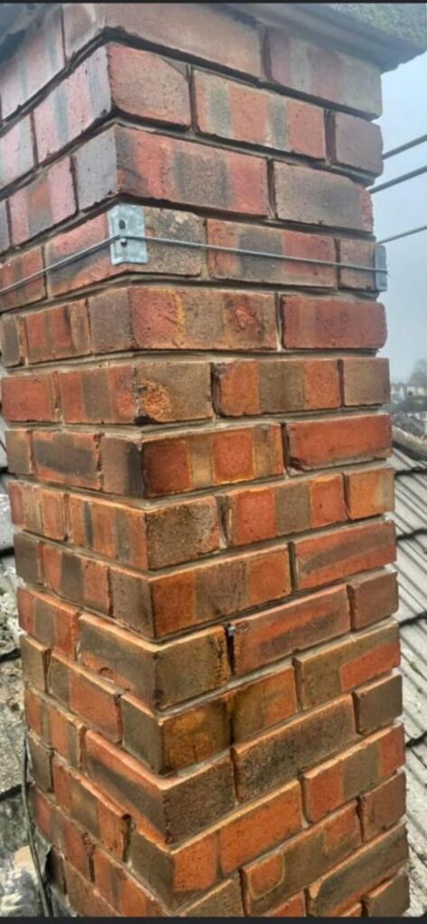 This is a photo that was taken just before this chimney stack was repointed. The work was done by Hinckley Roofing